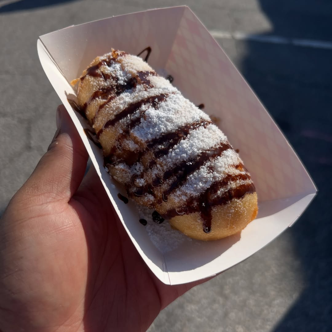 Deep fried cinnamon roll with chocolate drizzle