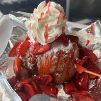 Deep fried cheesecake with strawberries
