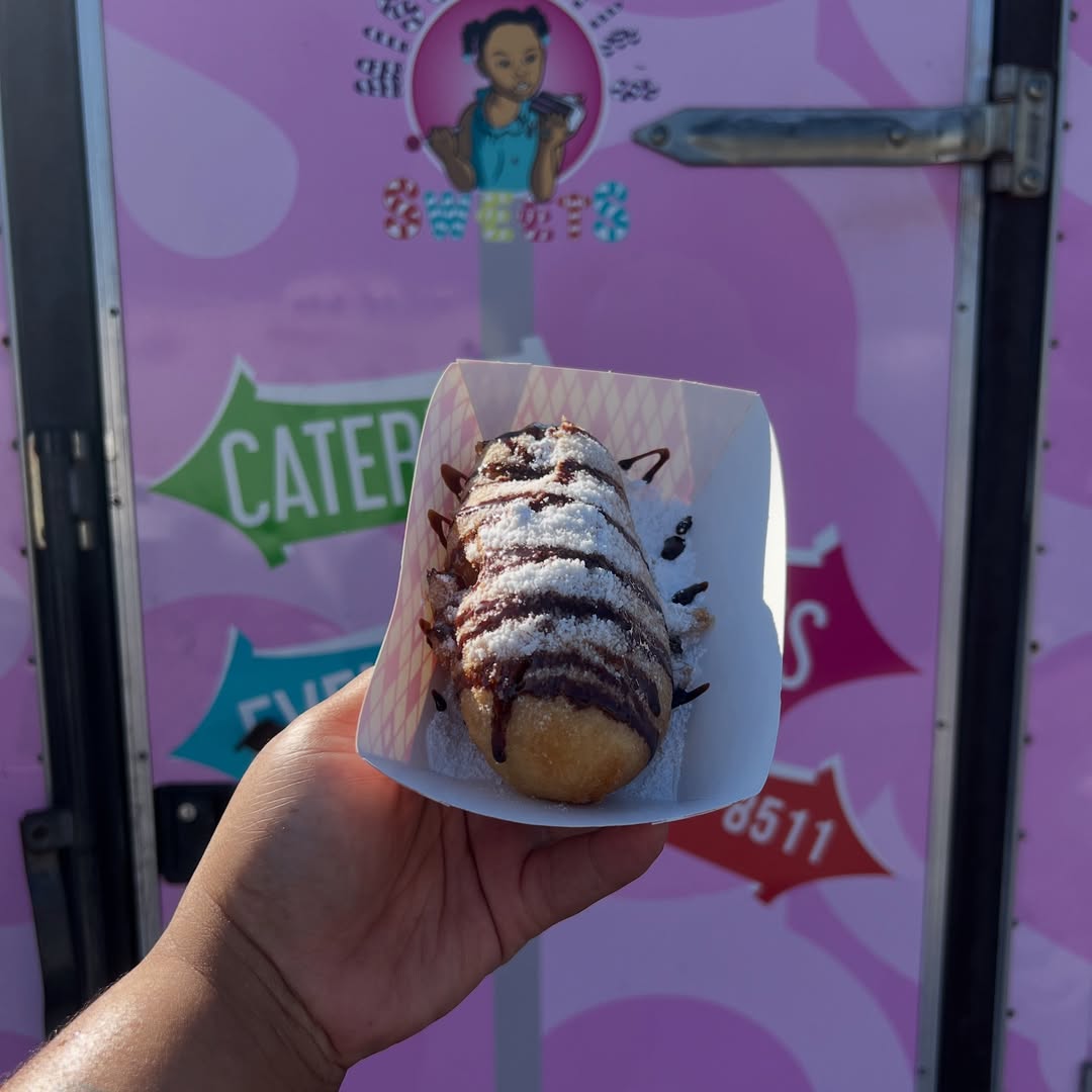 A fresh pastry outside the pink trailer